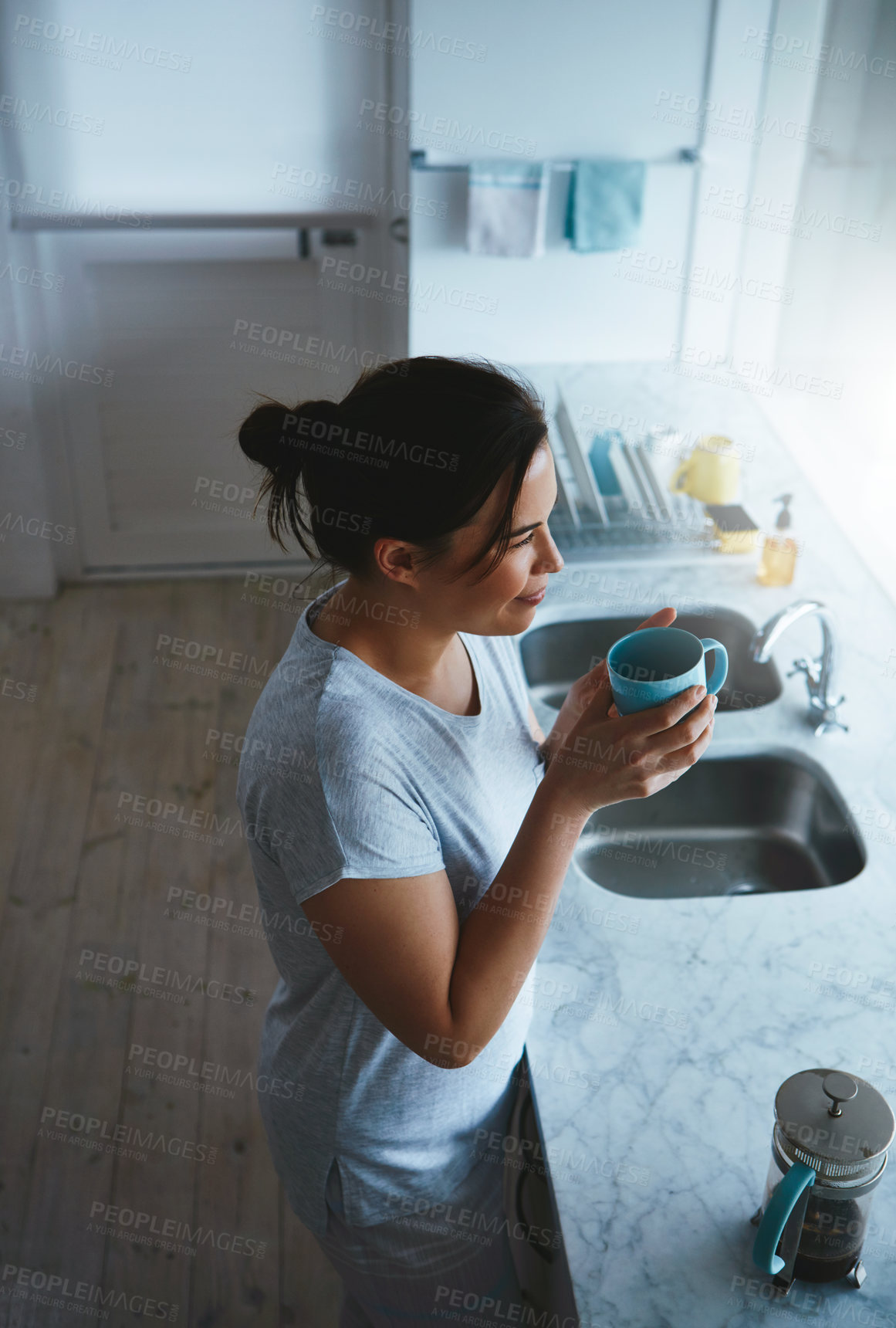 Buy stock photo Thinking, woman and coffee in kitchen, morning or relax with fresh beverage on break, above and home. Daydreaming, person and calm with caffeine in apartment, remember and reflection with hot drink