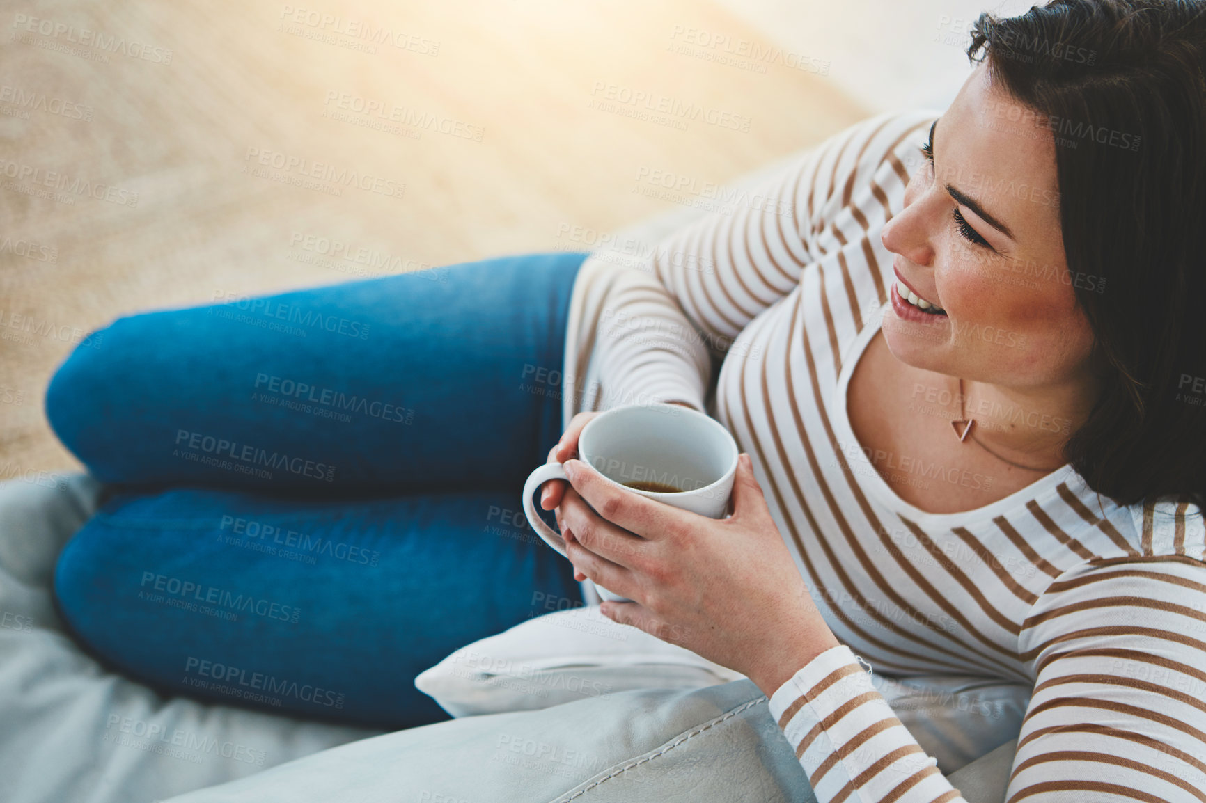 Buy stock photo Woman, coffee and happy with memory on sofa for thinking, relax and vision in home living room. Person, tea cup and smile on couch in lounge with drink, latte and above with reflection at apartment