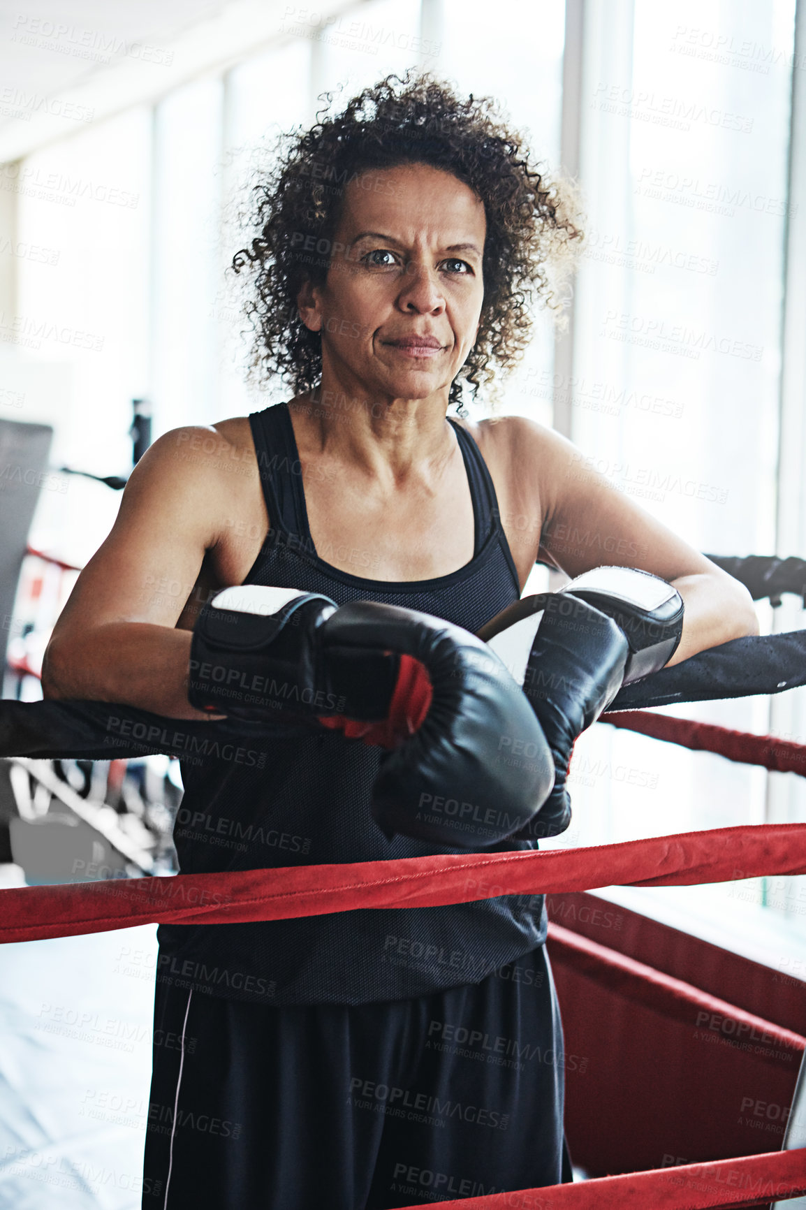 Buy stock photo Mature woman, boxer and portrait for training, exercise or fitness workout ready for fight at gym. Female fighter, boxing and competitive sports for ring match, health and wellness with endurance