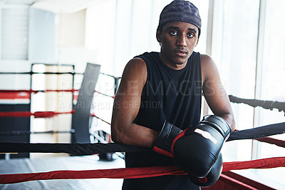 Buy stock photo Black man, boxer and portrait for training, exercise or fitness workout ready for fight at gym. African fighter, boxing and competitive sports for ring match, health and wellness with endurance