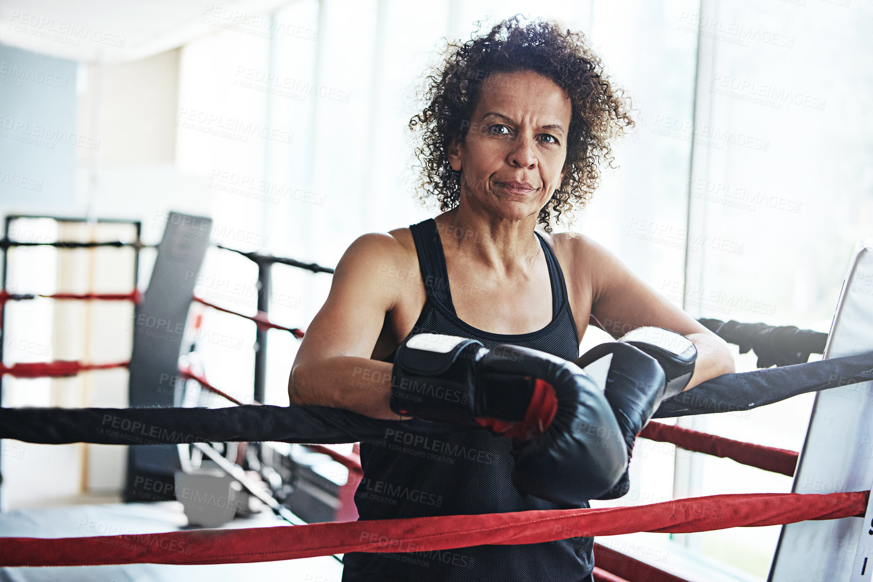 Buy stock photo Mature woman, boxer and portrait for exercise, fitness or training workout ready for fight at gym. Female fighter, boxing and competitive sports for ring match, health and wellness with endurance