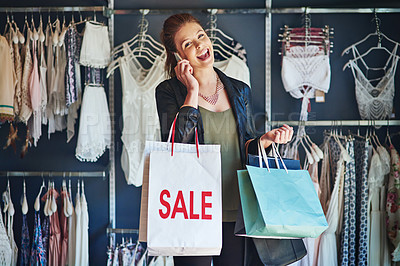 Buy stock photo Cropped shot of an attractive young woman on a shopping spree