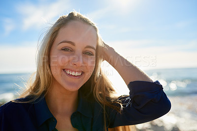 Buy stock photo Portrait of an attractive young woman enjoying a day outdoors