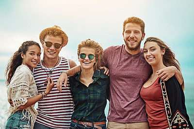 Buy stock photo Portrait of a group of friends spending time together outdoors