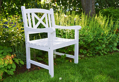 Buy stock photo Garden with white chair in springtime