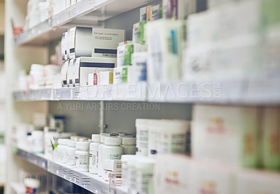 Buy stock photo Closeup, pharmacy and medicine with healthcare, pills and shelf with boxes, bottles and treatment. Zoom, medication and package with container, retail and store with pharmaceutical, items or products
