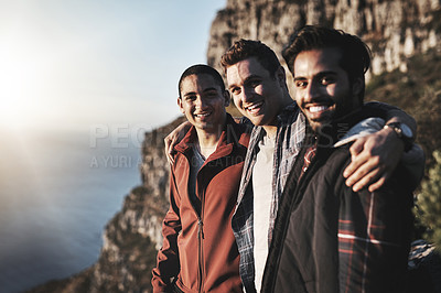 Buy stock photo Portrait of a group of friends admiring the view while hiking in the mountains