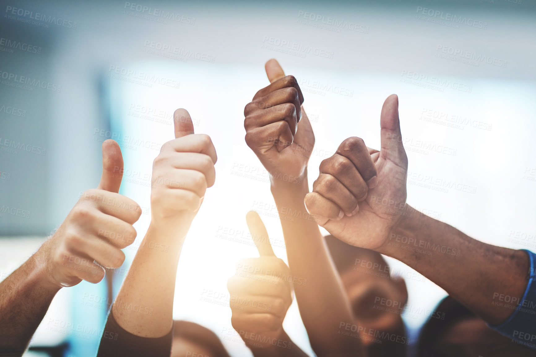 Buy stock photo Cropped shot of a team of colleagues showing thumbs up at work