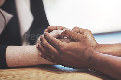Buy stock photo Cropped shot of two people holding hands in comfort