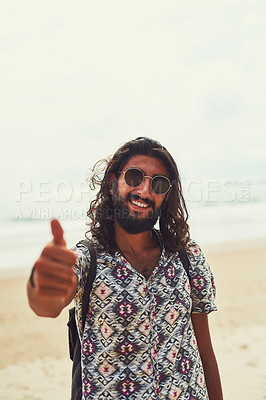 Buy stock photo Portrait of a happy young man exploring an exotic destination alone