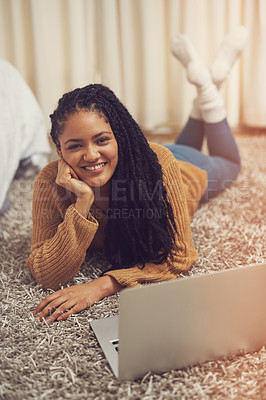 Buy stock photo Shot of a young woman lying on the floor with hr