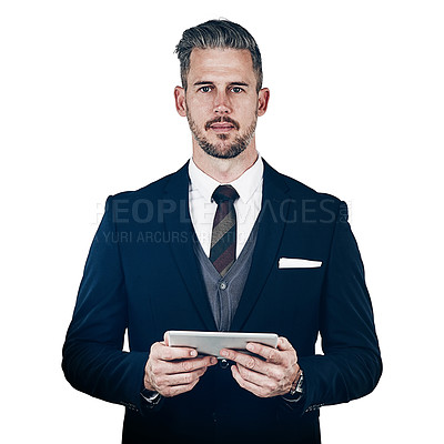 Buy stock photo Studio portrait of a businessman using a digital tablet against a white background