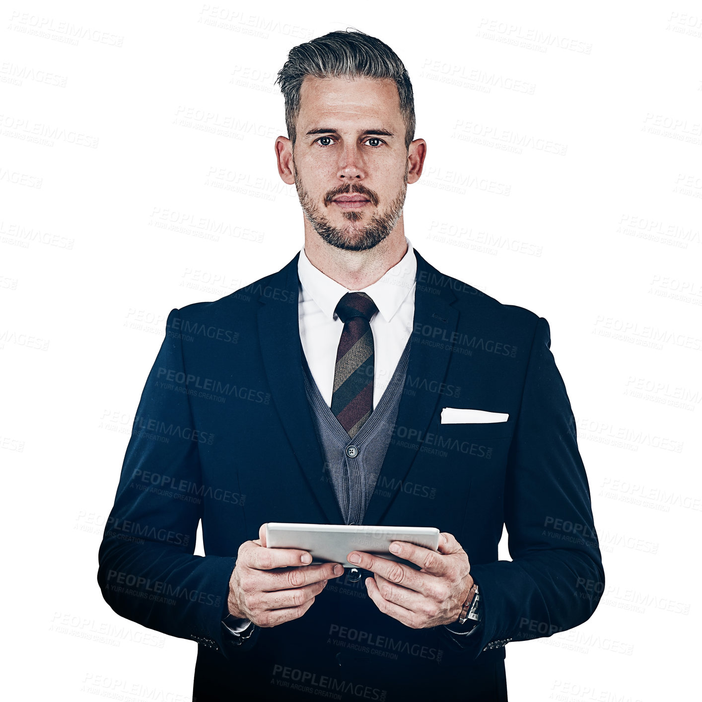 Buy stock photo Studio portrait of a businessman using a digital tablet against a white background