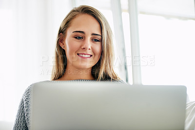 Buy stock photo Remote work, woman and smile with laptop for news, research and email at home. Female student, happy and computer in living room for job searching, internship opportunity and feedback in Australia