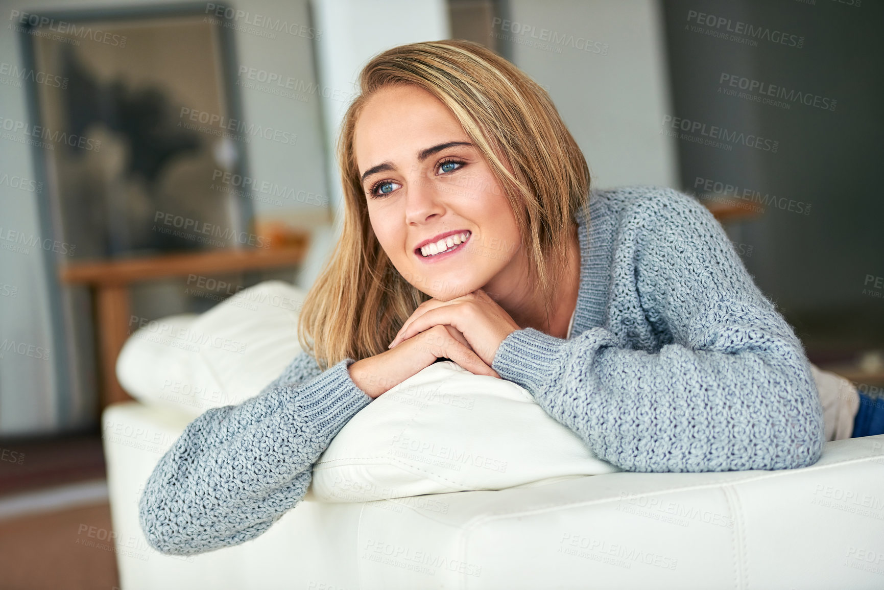 Buy stock photo Thinking, relax and happy woman on couch with smile in living room with home, house or apartment. Idea, comfortable lady or girl on sofa with peace or confidence resting on break for wellness