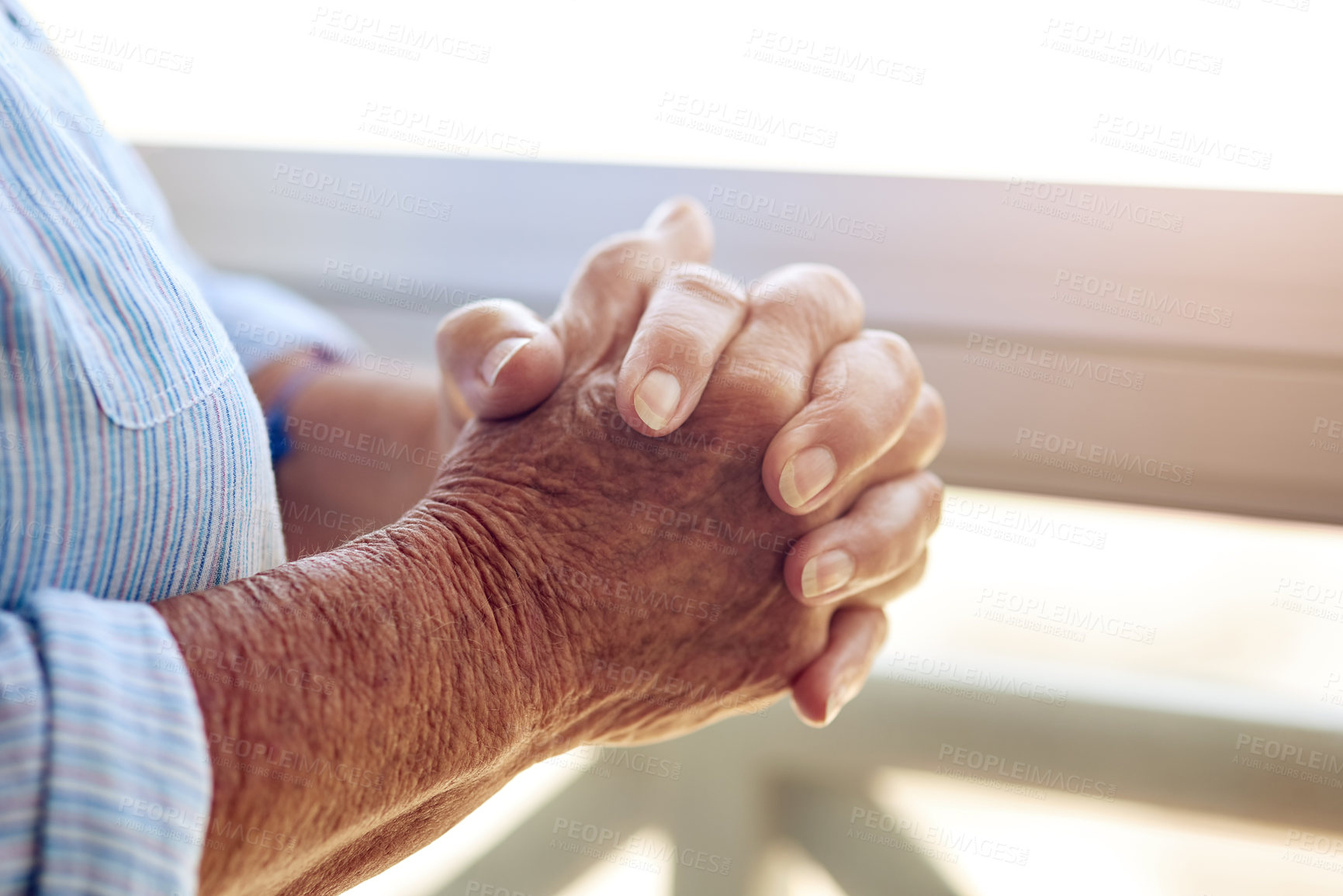 Buy stock photo Senior person, hands and prayer or waiting for visit, appointment or treatment in retirement home in elderly care. Pensioner, faith and trust in spirituality for wellbeing, relax and zen in zoom