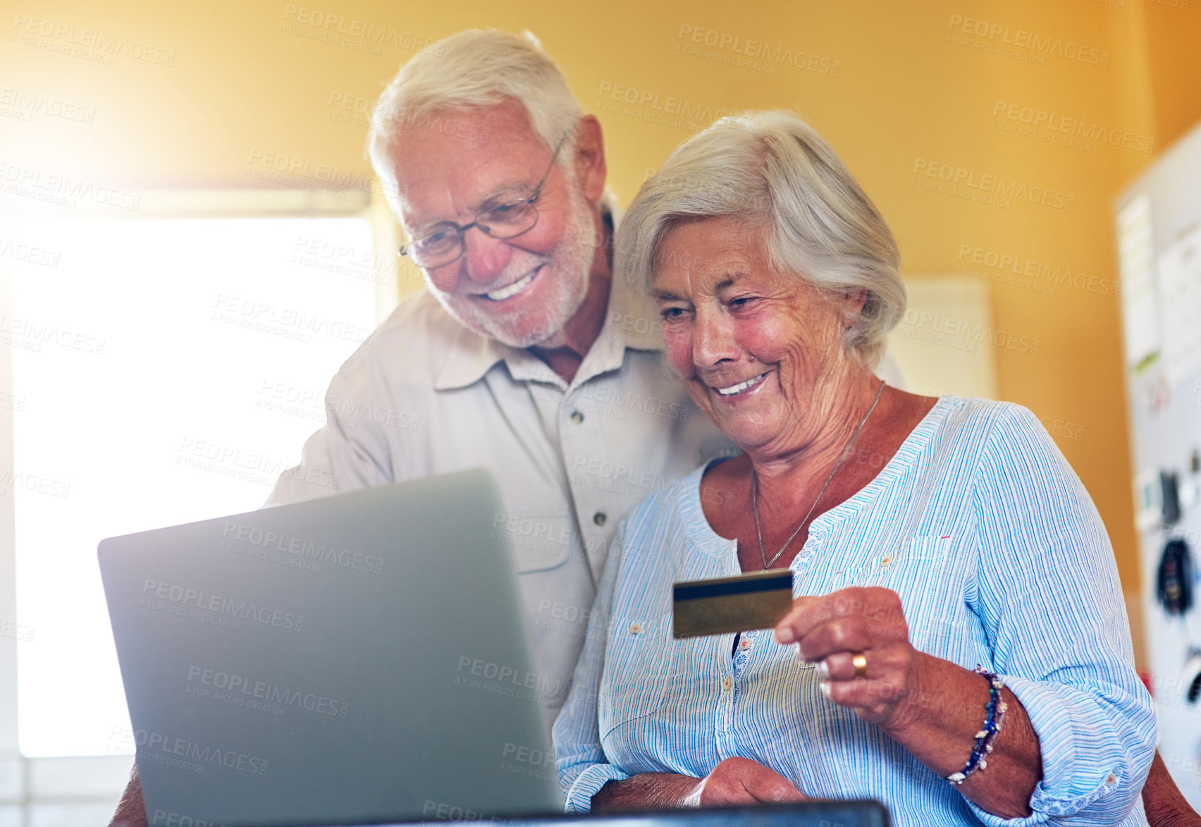 Buy stock photo Senior couple, credit card and laptop for ecommerce, online shopping or subscription in retirement home. Excited pensioners, cashless and banking at digital store for payment of order or purchase