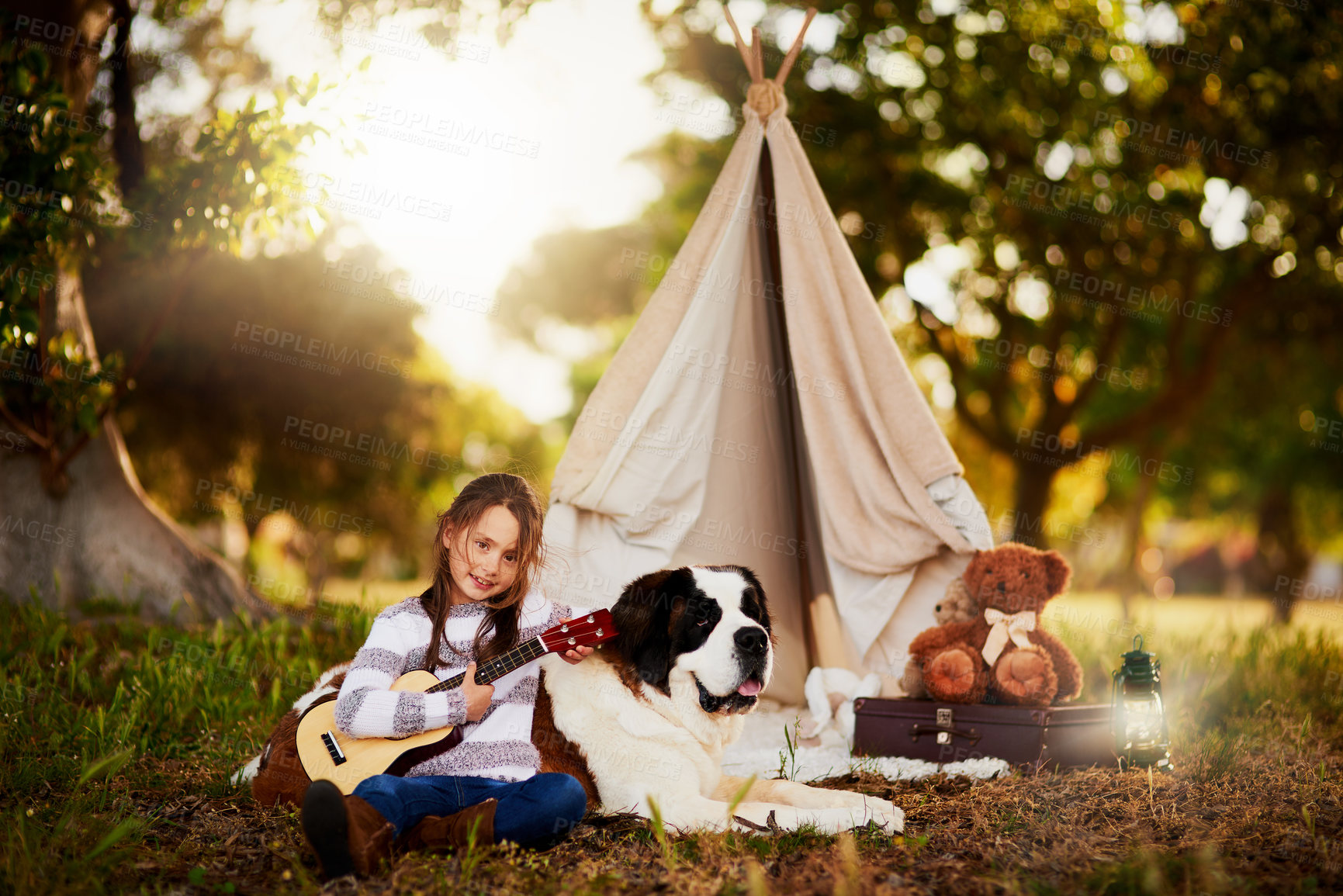 Buy stock photo Portrait, child and camping in nature with dog and guitar or adventure and relax in summer. Happy, girl and teepee or animal in backyard for fantasy or education and music or creativity for holiday