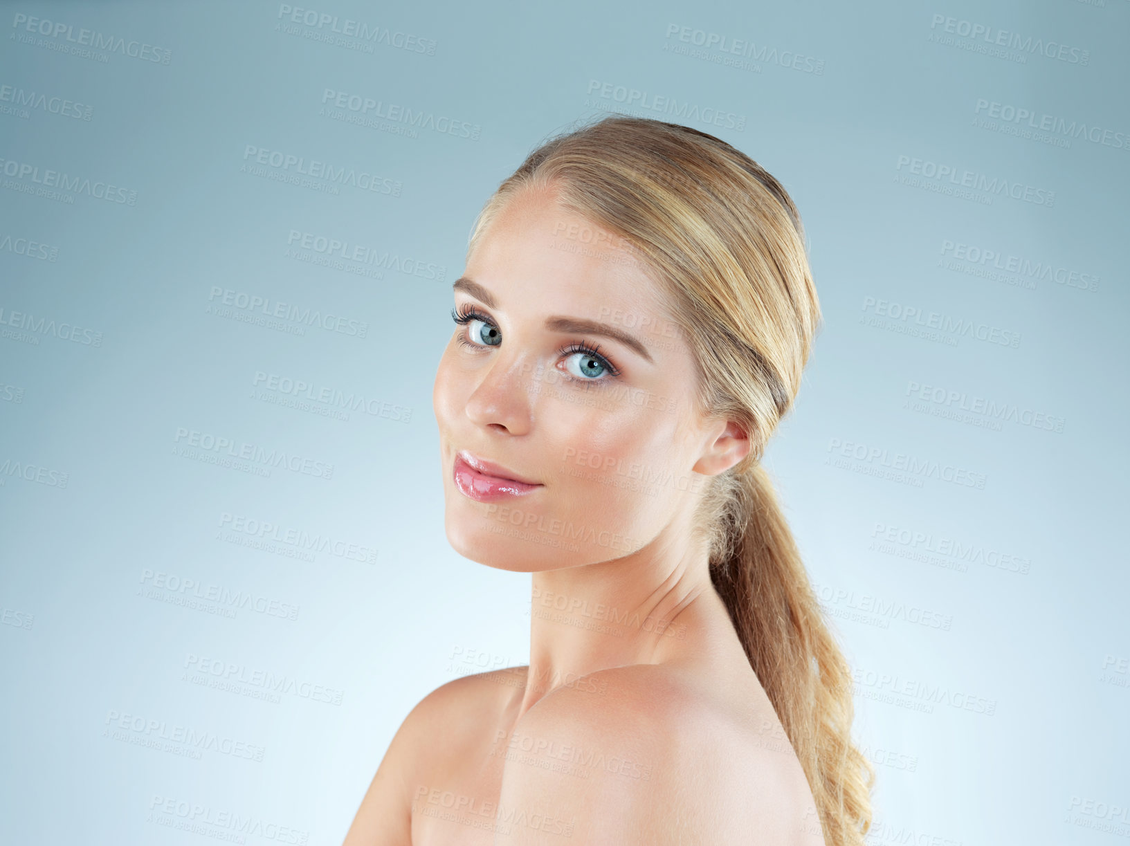 Buy stock photo Woman, portrait and cosmetics satisfaction in studio, transformation and beauty on blue background. Female person, skincare and foundation for smooth skin, facial treatment and dermatology pride