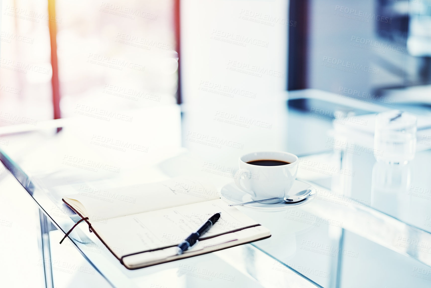 Buy stock photo Shot of a diary lying on a table in an empty office