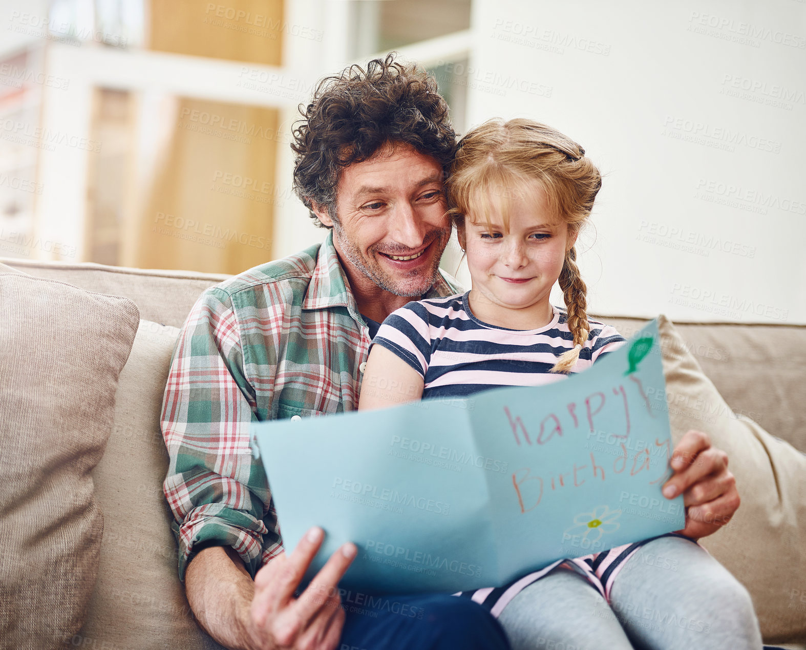 Buy stock photo Birthday card, father and girl on sofa, home and expression with gift, time together and smile. Parent, dad and daughter on couch, present and happiness with fun, cheerful and excited with love