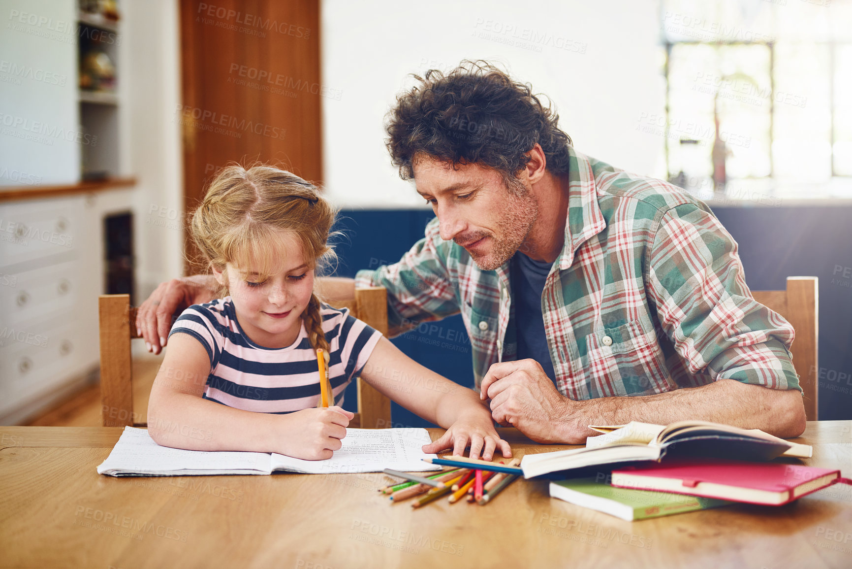 Buy stock photo Homework, books and father with child in house for education project by table together. Reading, bonding and dad helping girl kid student with writing study notes for private school admission exam.