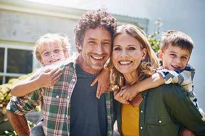 Buy stock photo Portrait of a happy family spending time together outdoors