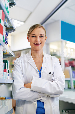 Buy stock photo Portrait of a confident young woman working in a pharmacy