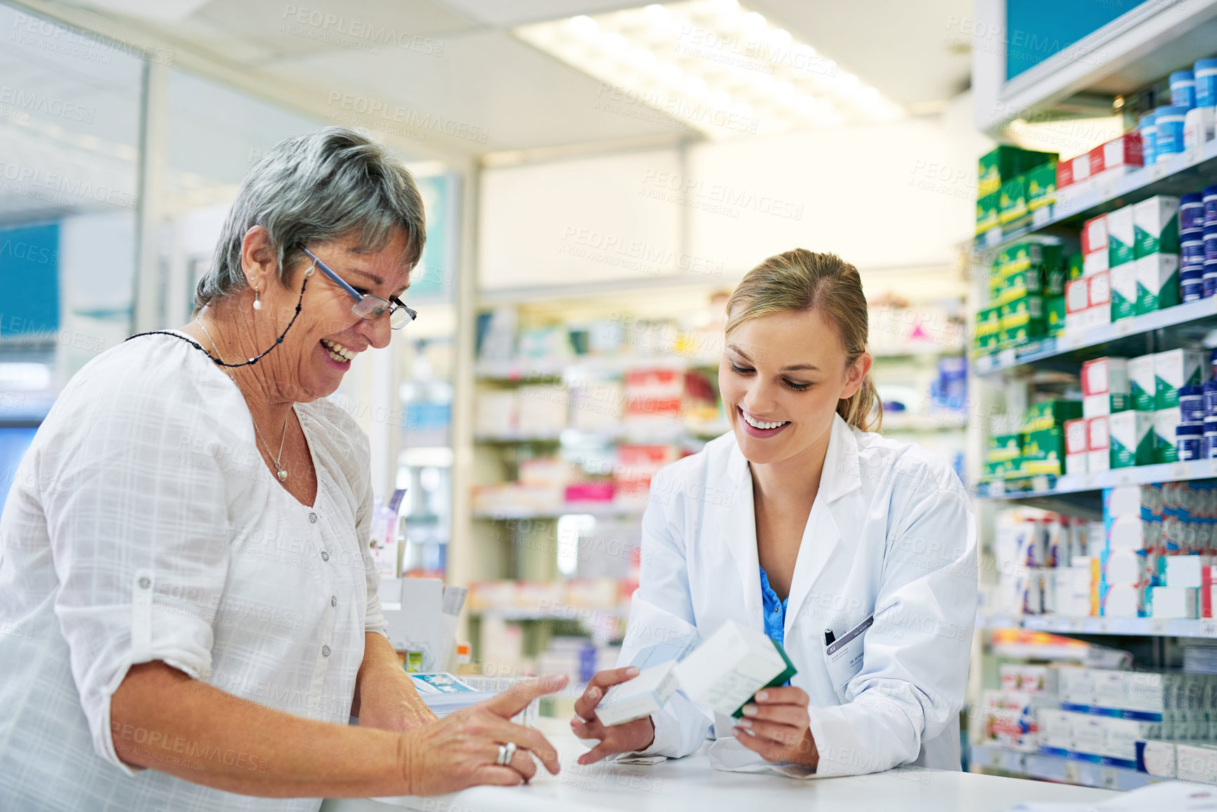 Buy stock photo Pharmacist explaining prescription medication to woman in the pharmacy for pharmaceutical healthcare treatment. Medical, counter and female chemist talking to patient on medicine in clinic dispensary