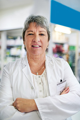 Buy stock photo Portrait of a confident mature woman working in a pharmacy