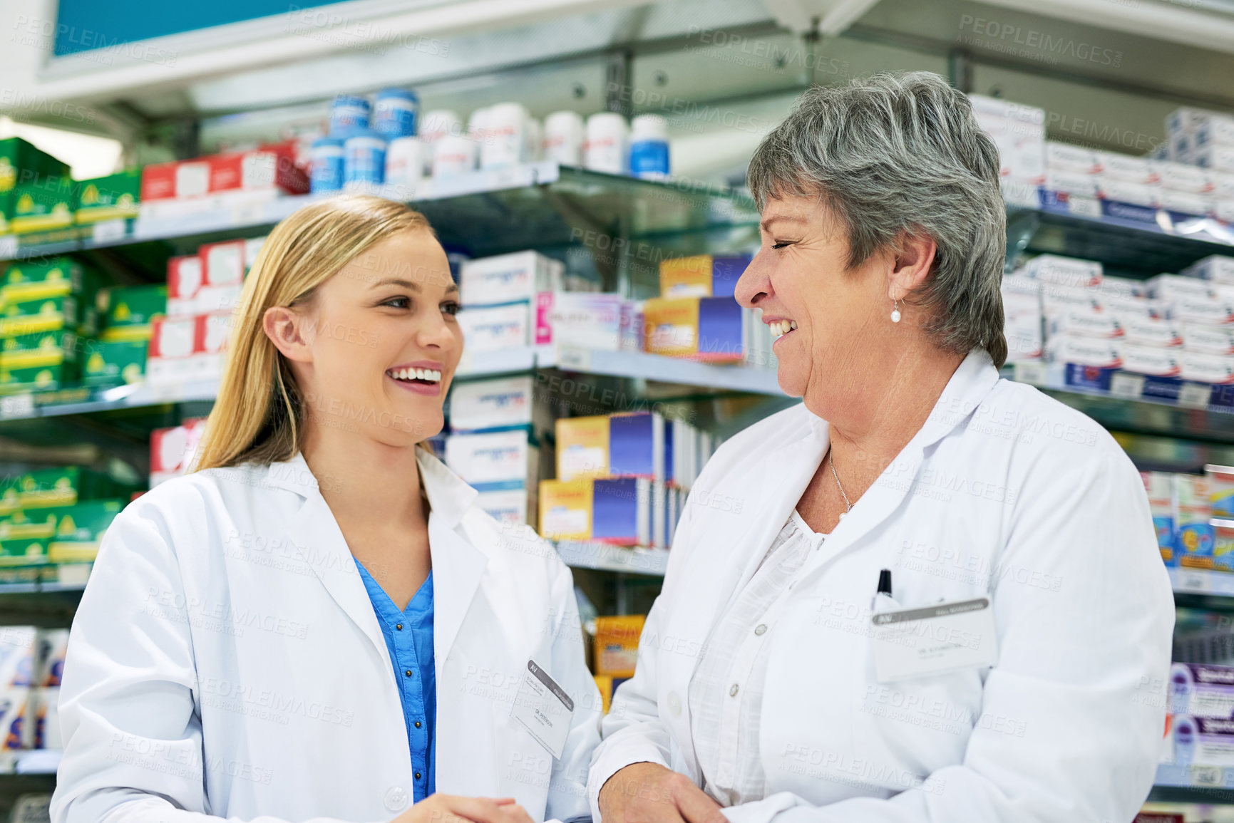 Buy stock photo Woman, colleagues and pharmacy store for healthcare teamwork or laughing, medication or purchase. Female people, humor and chemist internship for tablet consulting or professional, shopping or shelf