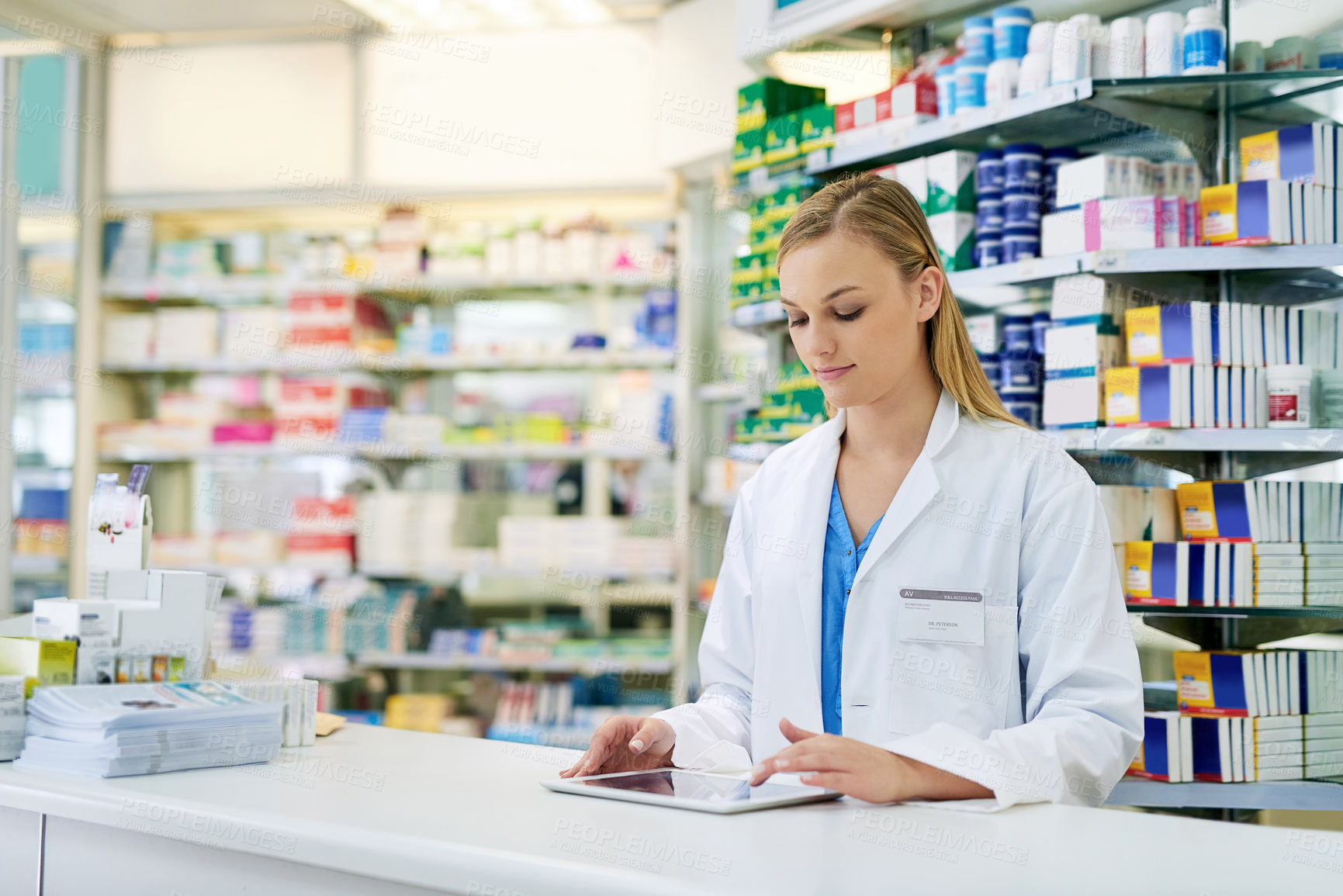 Buy stock photo Pharmacy, female pharmacist and digital tablet to order medication, check inventory and inspection. Healthcare, woman or expert and technology for research information, pills and prescription