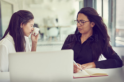 Buy stock photo Cropped shot of a businesswoman sneezing in her colleague's face in an office