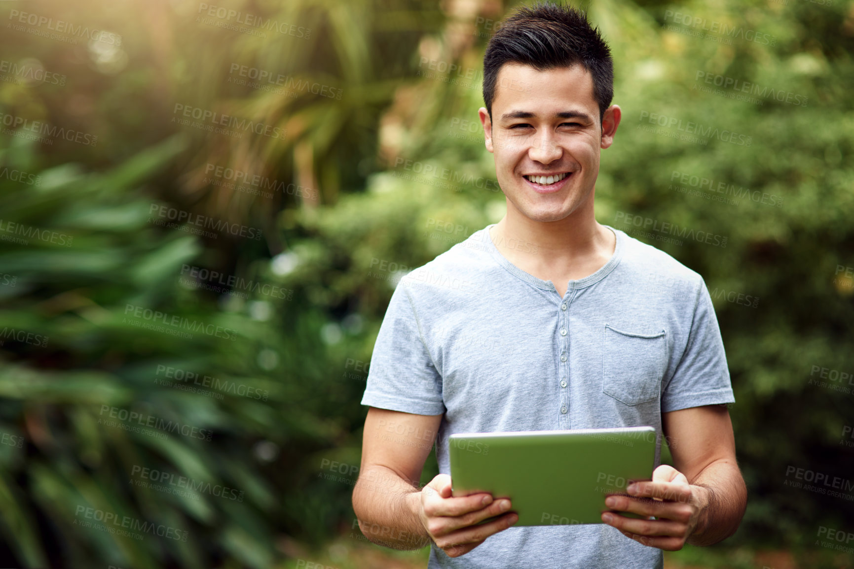 Buy stock photo Nature, portrait and man with tablet for social media, awareness or sustainability search in forest. Online, activist and person with tech for conservation, deforestation prevention or information