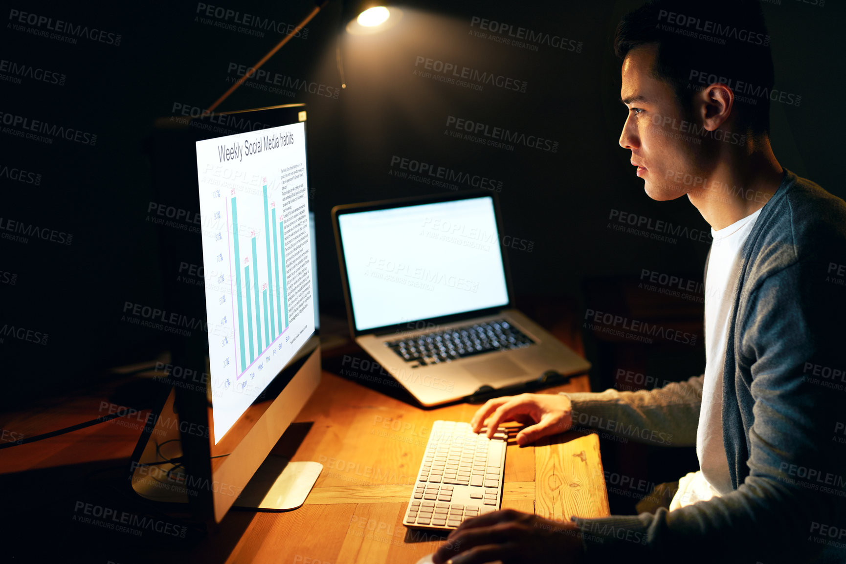 Buy stock photo Side view, businessman and computer with chart screen for feedback, review and market research in dark office. Programmer guy, monitor and data analytics for app development, coding and website stats