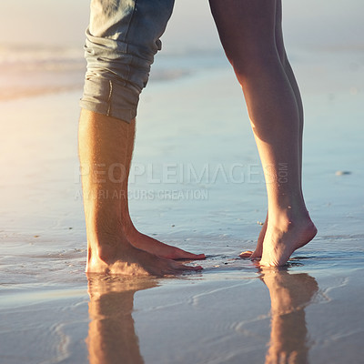 Buy stock photo Couple, feet and beach with tiptoe by water for bonding, love or together for connection on vacation. People, partner and toes in sand for trust, care or summer sunshine by ocean on holiday in Greece