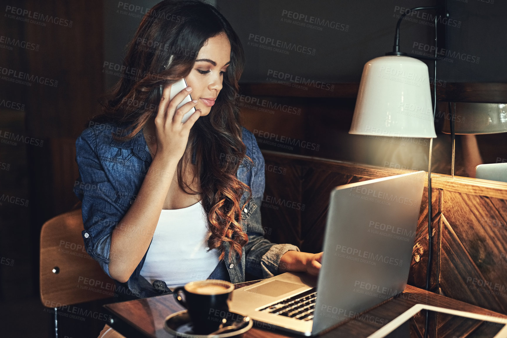 Buy stock photo Phone call, remote work and woman in cafe with laptop for networking, communication or conversation at table. Coffee, virtual assistant and female person for planning, confirm schedule or freelancer