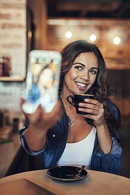 Buy stock photo Woman, coffee and selfie smile in cafe for social media post, communication and happy memory. Female person, food influencer and picture or live streaming for daily vlog, blog update and camera app