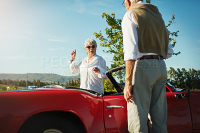 Buy stock photo Shot of a senior couple going on a road trip 