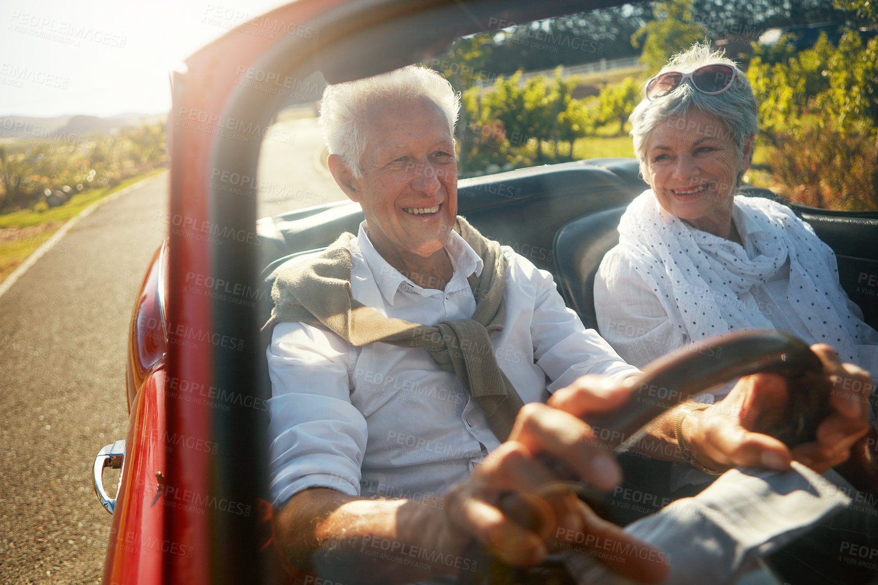 Buy stock photo Shot of a senior couple going on a road trip 