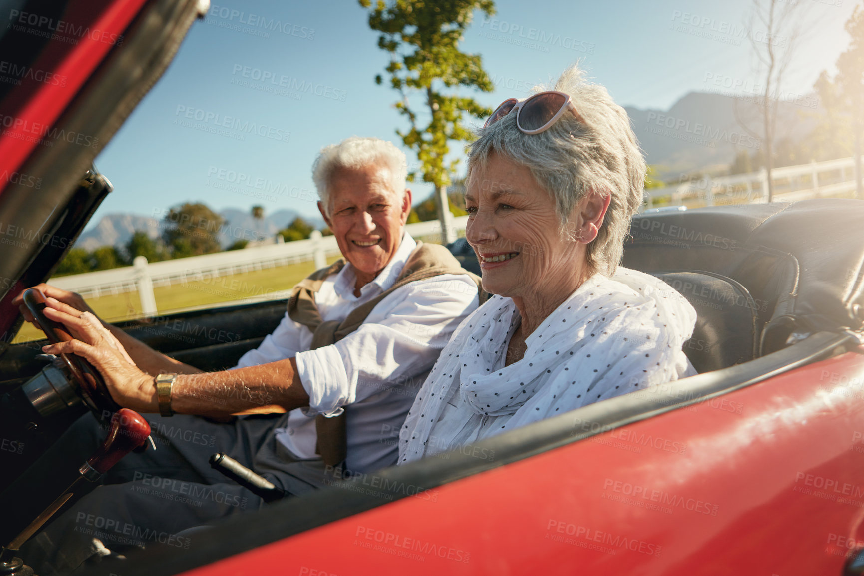 Buy stock photo Shot of a senior couple going on a road trip 