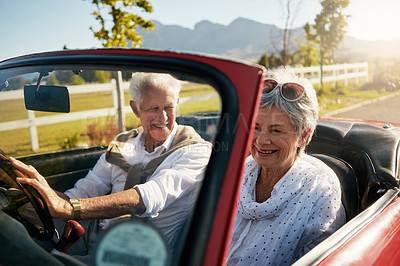 Buy stock photo Old couple, road trip and convertible car in nature vineyard for retirement travel, marriage or adventure. Man, woman and vehicle transportation in California for explore trip, romance or journey