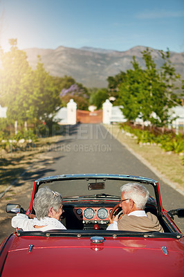 Buy stock photo Shot of a senior couple going on a road trip 