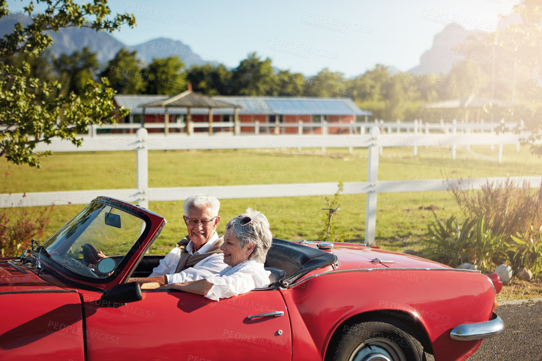 Buy stock photo Shot of a senior couple going on a road trip 