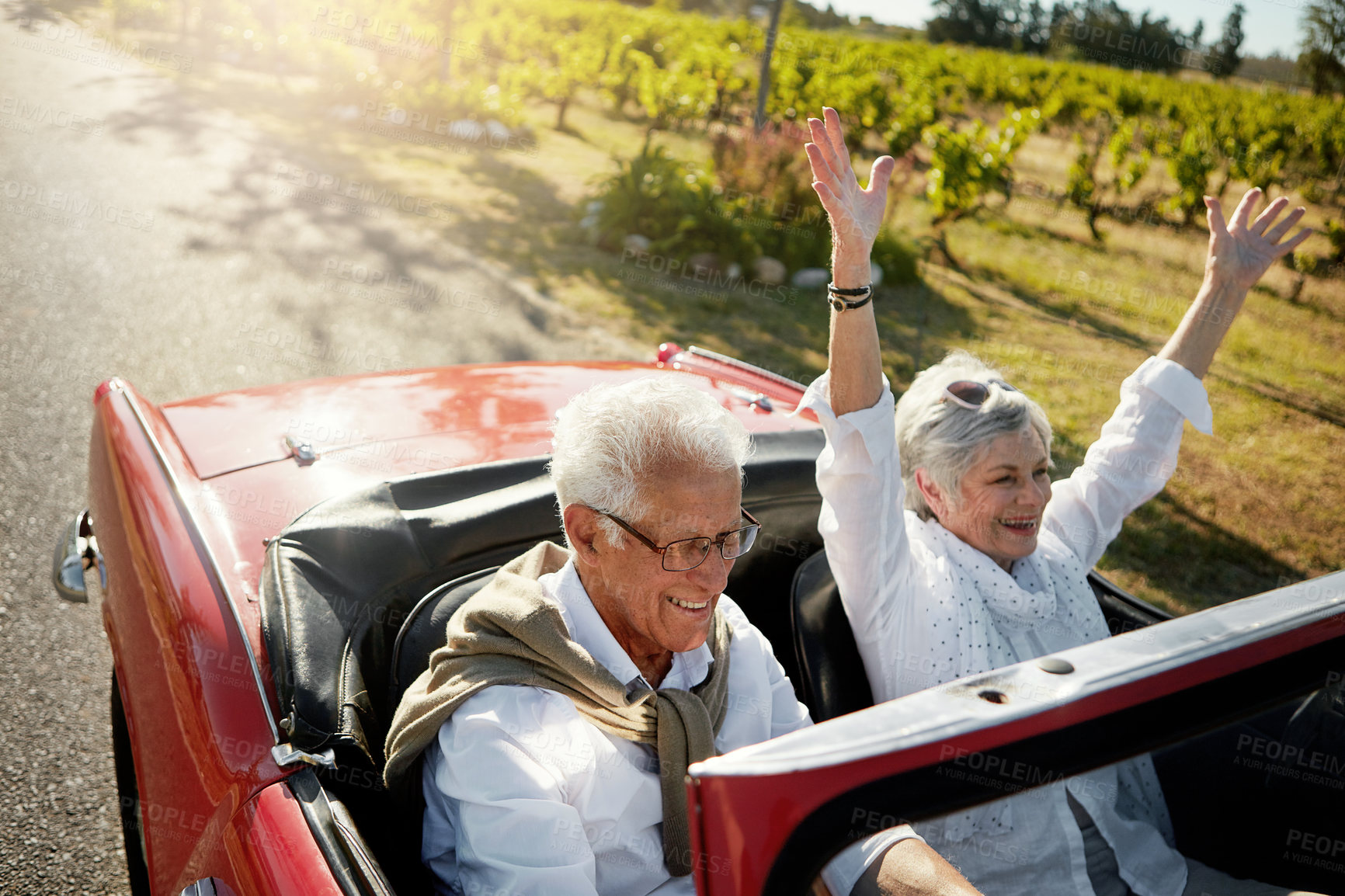 Buy stock photo Shot of a senior couple going on a road trip 