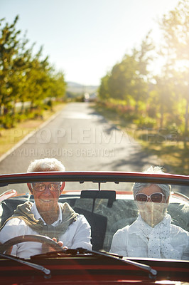 Buy stock photo Shot of a senior couple going on a road trip 