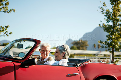 Buy stock photo Shot of a senior couple going on a road trip 