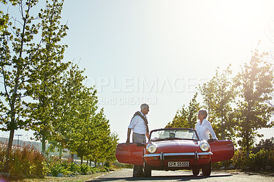 Buy stock photo Shot of a senior couple going on a road trip 