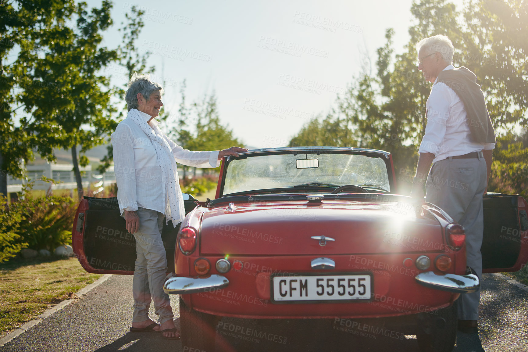 Buy stock photo Shot of a senior couple going on a road trip 