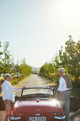 Buy stock photo Shot of a senior couple going on a road trip 